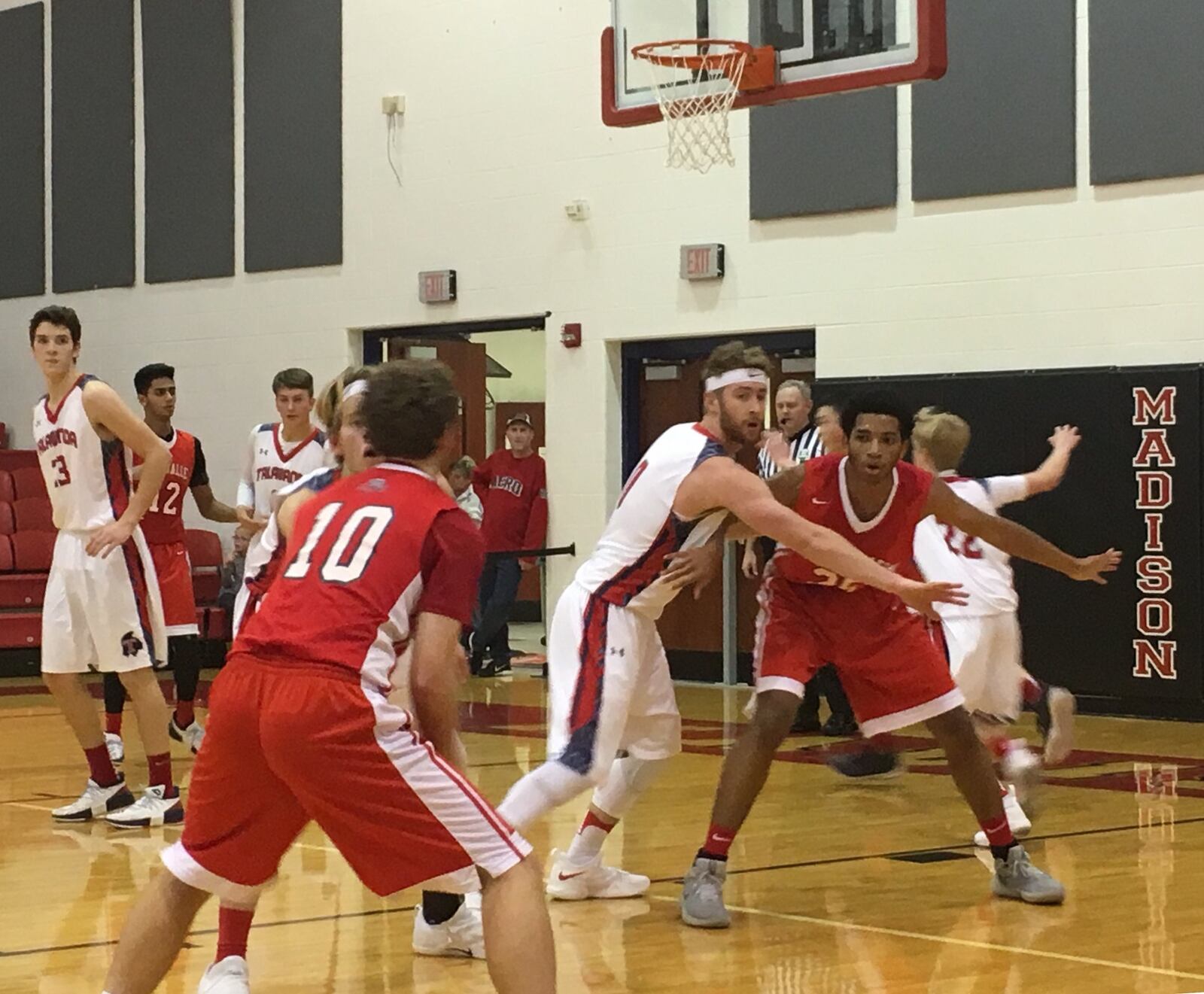 Talawanda’s Evan James defends Miami Valley’s Marc Williams as Alec Martin (10) looks to make a pass Thursday night during the Brian Cook Classic at Madison. Talawanda advanced with a 51-48 victory. RICK CASSANO/STAFF