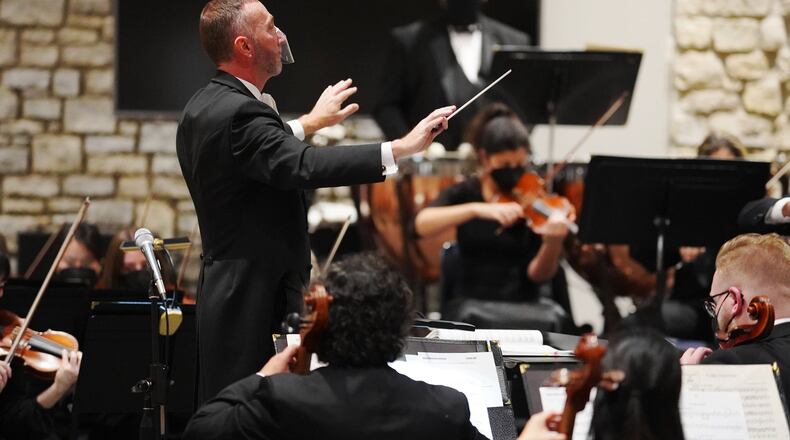 Scott Woodard conducts the Butler Philharmonic in an October 2021 concert at First Baptist Church in Hamilton. FILE