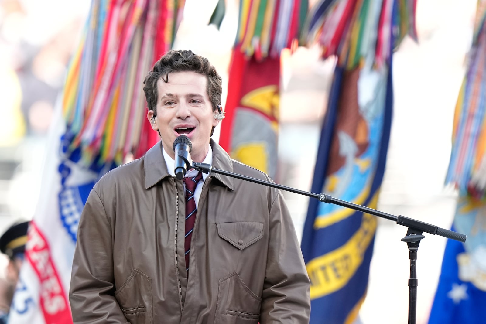 Charlie Puth performs the national anthem before the NFL Super Bowl 60 football game between the Seattle Seahawks and the New England Patriots, Sunday, Feb. 8, 2026, in Santa Clara, Calif. (AP Photo/Frank Franklin II)