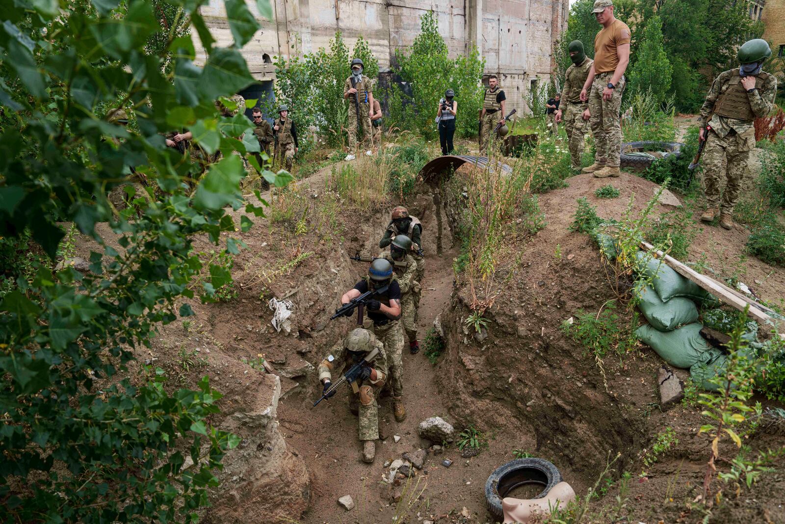 Ukrainian 3rd Assault Brigade recruits train at the polygon in Kyiv region, Ukraine, on Wednesday, July 16, 2025. (AP Photo/Evgeniy Maloletka)