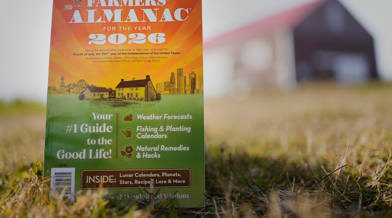 FILE -A copy of the final edition of the Farmers' Almanac is seen, Friday, Nov. 7, 2025, in Alexander, Maine. (AP Photo/Robert F. Bukaty)