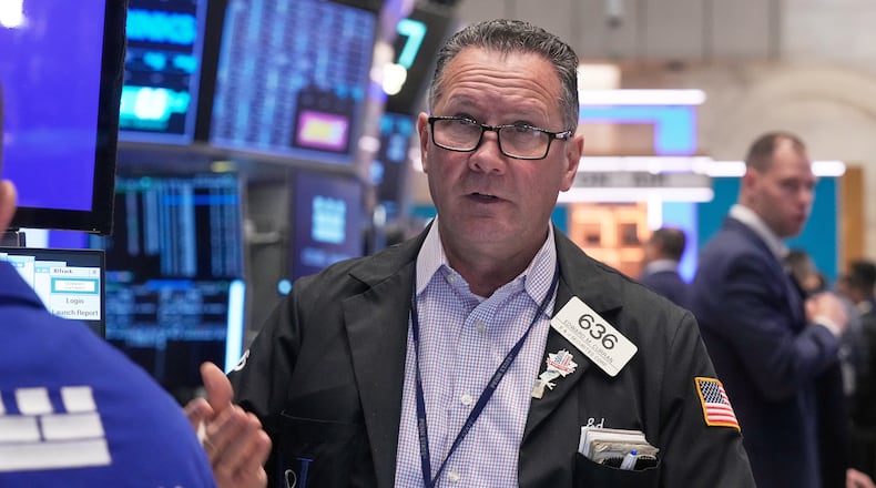 Trader Edward Curran works on the floor of the New York Stock Exchange, Monday, Nov. 24, 2025. (AP Photo/Richard Drew)