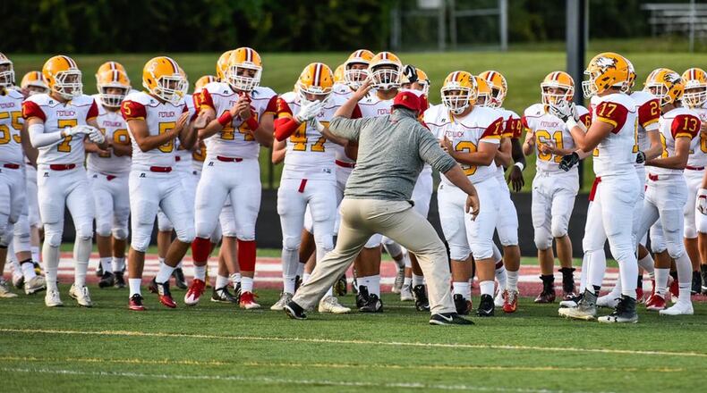 Fenwick starts getting geared up for a Sept. 8 game at Lebanon. It was won by the host Warriors 49-27. NICK GRAHAM/STAFF