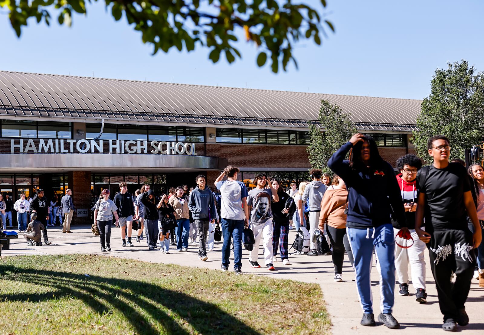 Students exit Hamilton High School at the end of the school day Thursday, Oct. 3, 2024 in Hamilton. NICK GRAHAM/STAFF