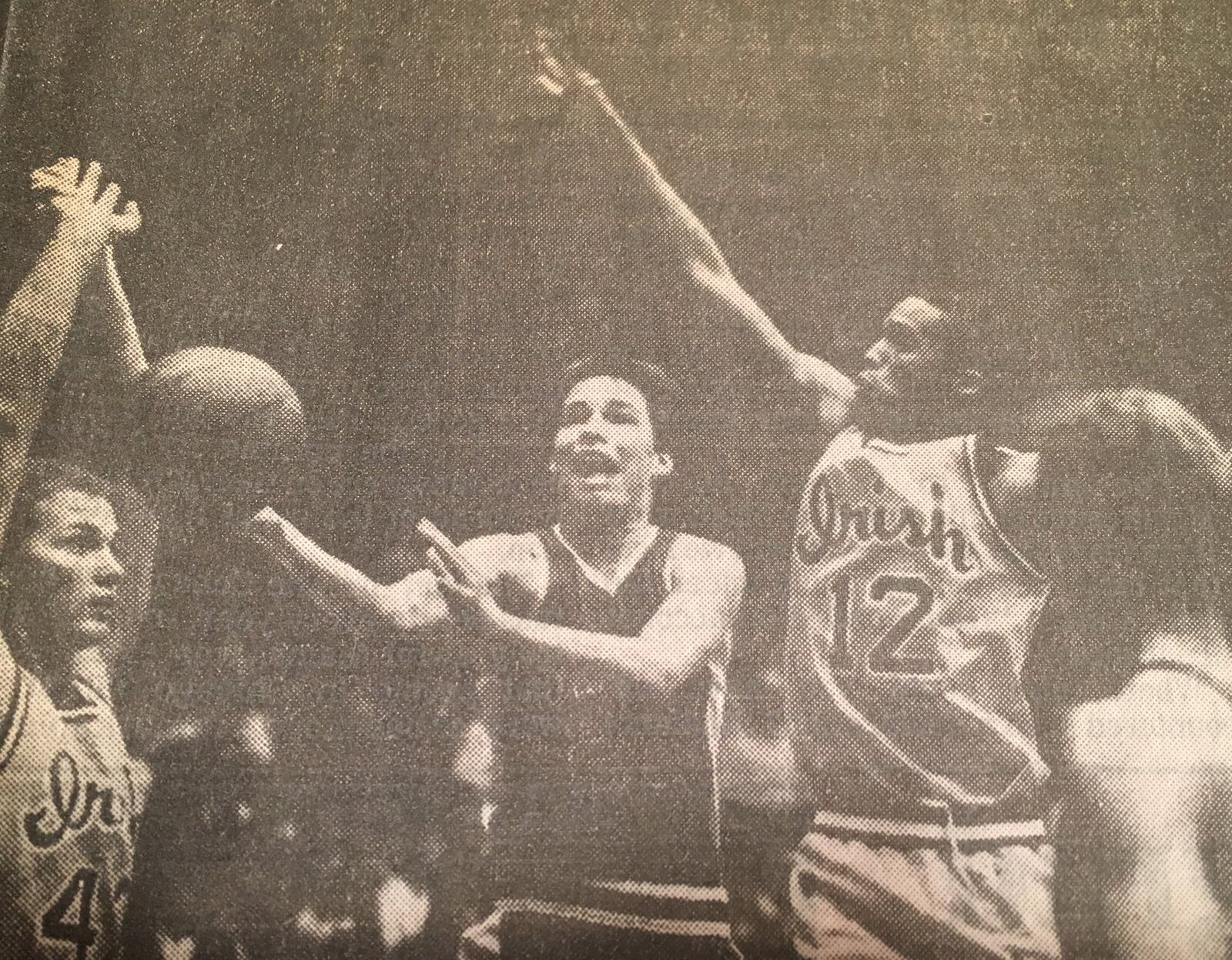 Badin’s Kevin McGuff cuts between Springfield Catholic Central’s Chris Kestner (42) and Maurice Houston (12) on March 19, 1988, during the Rams’ 51-48 overtime victory in a Division III regional final at the University of Dayton Arena. COX MEDIA FILE PHOTO