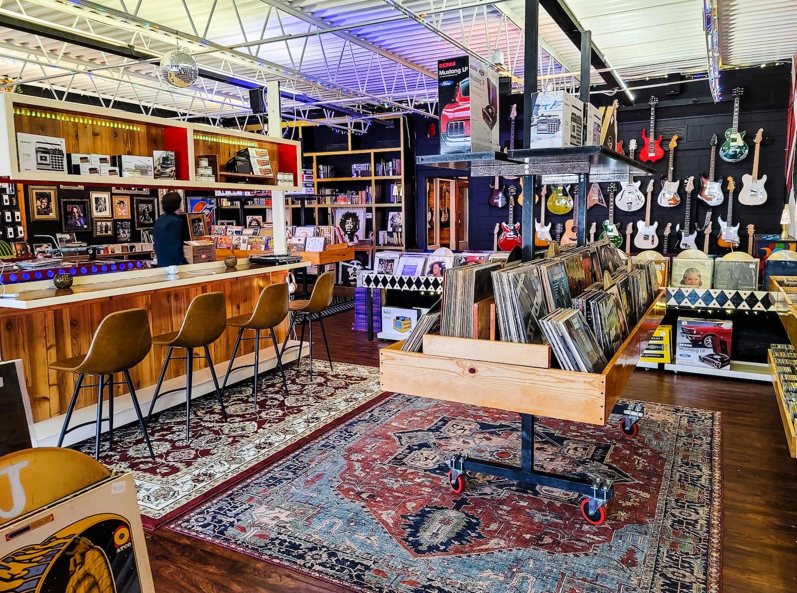 Three Feather Records is now open on 1105 Magie Drive in Fairfield. The shop has new and used records, turntables and accessories, guitars, music posters, t-shirts, books and more. Most of the shelving in the store is on wheels so it can be moved out of the way for live music performances on occasion. The shop is run by Eric DePrato and his two sons Jack and Mitch. NICK GRAHAM / STAFF