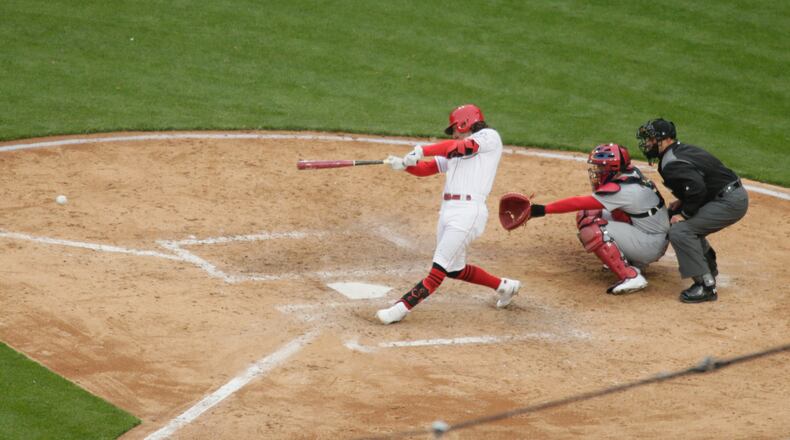 Jonathan India, of the Reds, singles against the Cardinals on Thursday, April 1, 2021, at Great American Ball Park in Cincinnati. David Jablonski/Staff
