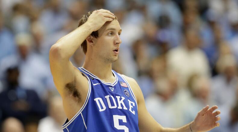 CHAPEL HILL, NC - MARCH 04: Luke Kennard #5 of the Duke Blue Devils watches on during their game against the North Carolina Tar Heels at the Dean Smith Center on March 4, 2017 in Chapel Hill, North Carolina. (Photo by Streeter Lecka/Getty Images)