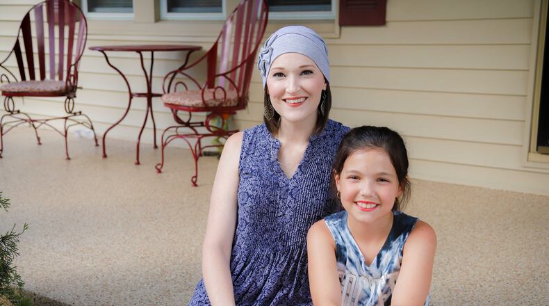 Amanda Monnin, 35, a single mother from Hamilton, is recovering from brain cancer and Garage Floors and More upgraded the porch for Monnin and her daughter, Audriana. SUBMITTED PHOTO