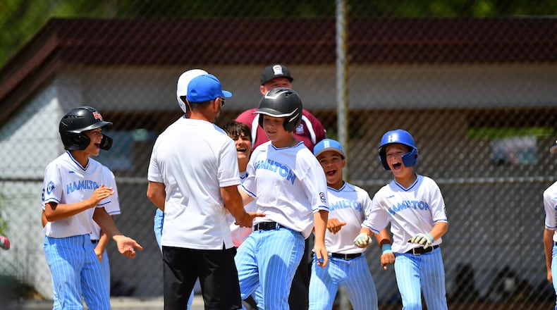 West Side's Gavyn Spears crosses the plate after hitting a grand slam during his Ohio Little League state championship game against New Albany on Thursday at the Field of Dreams in Boardman. West Side won 17-5. KYLE HENDRIX / CONTRIBUTED