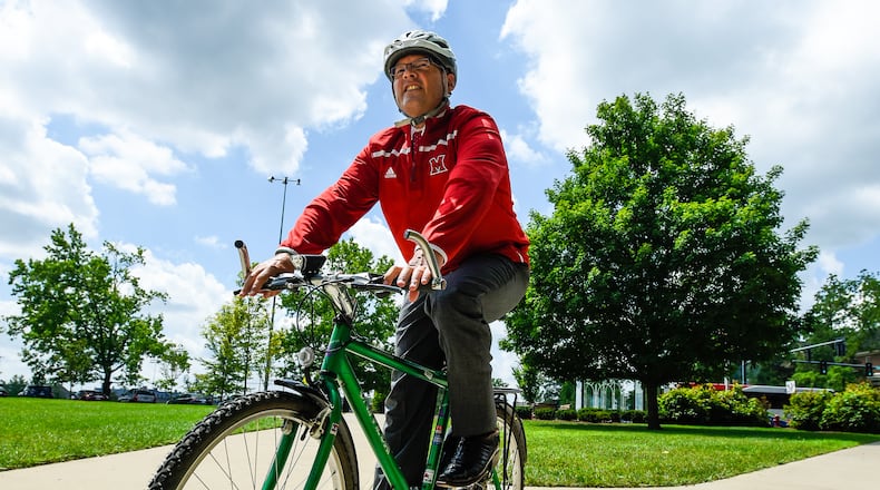 Miami University President Dr. Gregory Crawford (pictured) is the keynote speaker for the 7th bi-annual Butler County National Philanthropy Day. He and his wife, Dr. Renate Crawford, have bicycled across the country to raise awareness and funds for research on Niemann-Pick Type C Disease, a rare and deadly neurodegenerative disease. NICK GRAHAM/2016