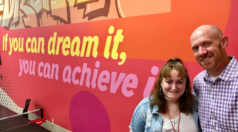 Fairfield Academy junior Ellie Frye - pictured with Academy Director Kyle Jamison - credits the public school district’s alternative program for her academic success. The academy in the Butler County school system was started in 2014 and now enrolls 111 students in grades 9-12. (Photo by Michael D. Clark/Journal-News)