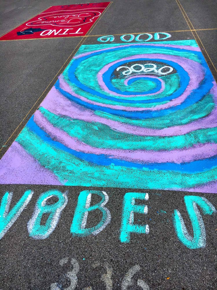 PHOTOS Lakota East seniors paint parking spots