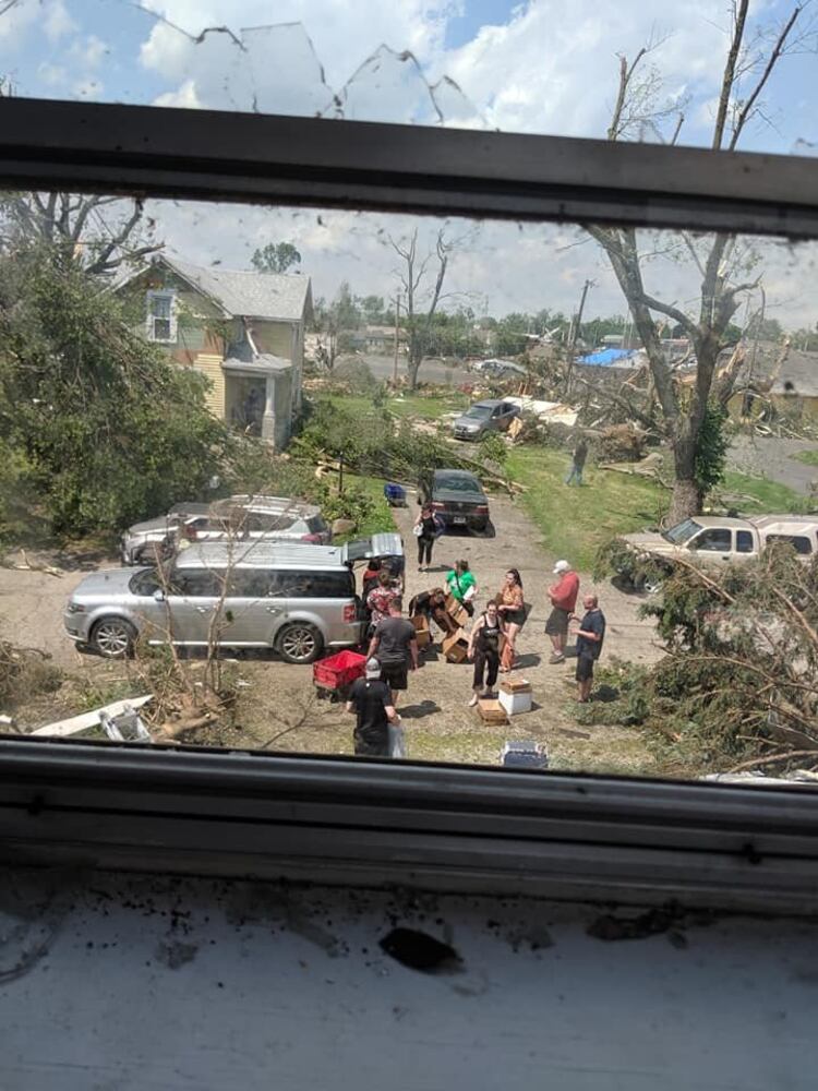 Photos: Community rallies around Dayton restaurant owner after son’s death, tornado