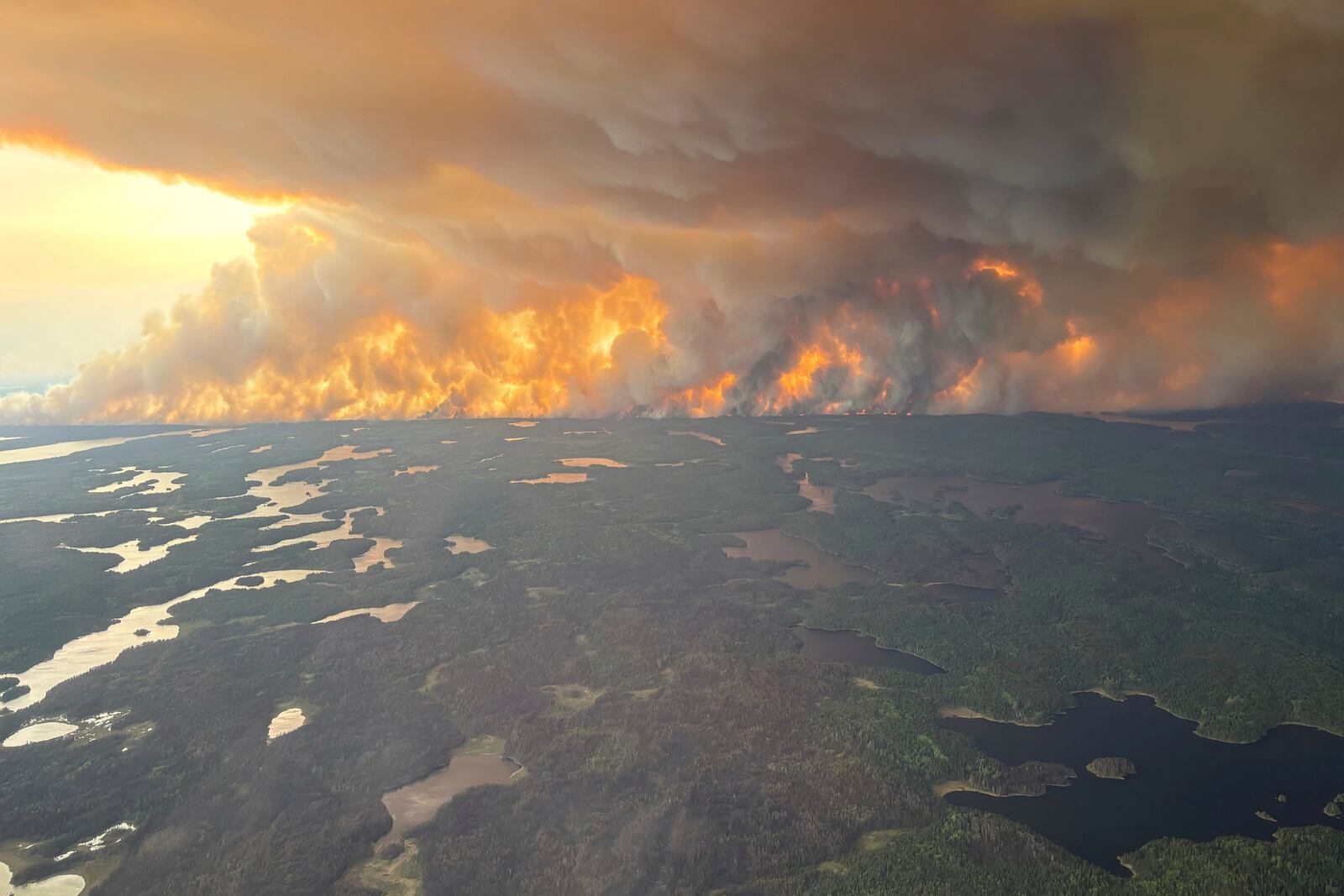 This photo provided by the Manitoba government shows wildfires in Flin Flon, Manitoba, Canada on Tuesday, May 27, 2025. (Manitoba government via AP)