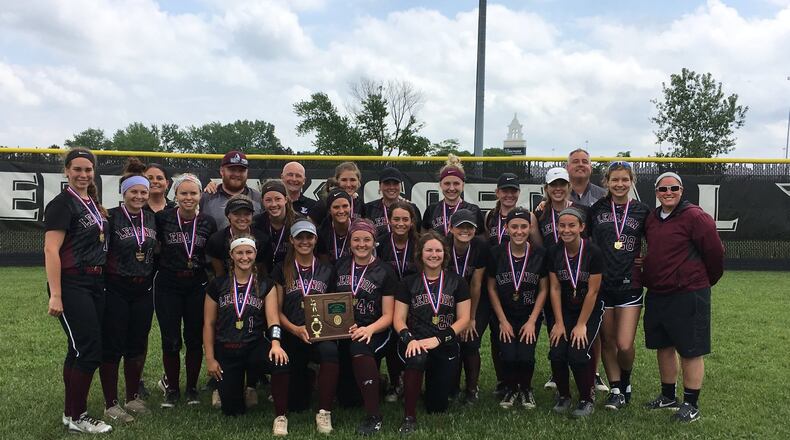 The Lebanon Warriors get together for a team photo after Saturday’s 5-1 victory over Fairfield in a Division I district final at Lakota East. RICK CASSANO/STAFF