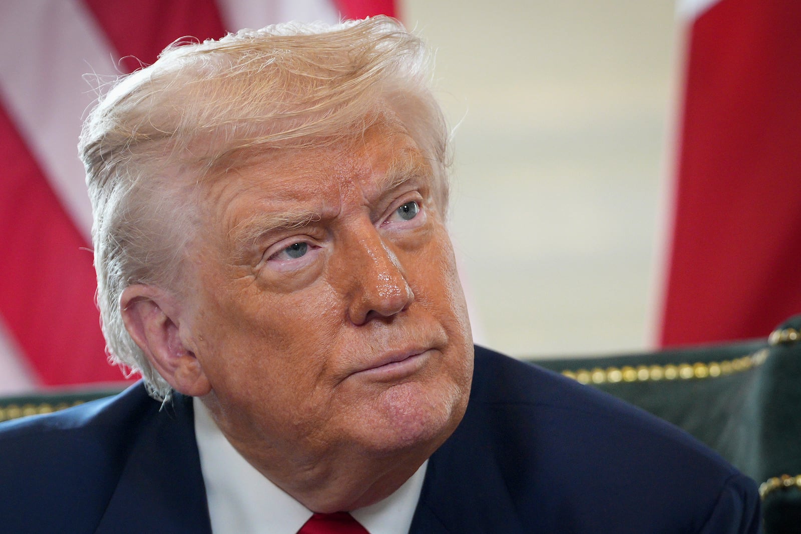U.S. President Donald Trump talks to the media as he meets with British Prime Minister Keir Starmer at Trump Turnberry golf club in Turnberry, Scotland, Monday, July 28, 2025. (Christopher Furlong/Pool Photo via AP)