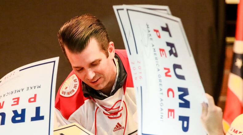 Donald Trump Jr., the son of Republican presidential candidate Donald Trump, campaigned at the Brick Street Bar in Oxford, Monday, Oct. 24, with many Miami University students in attendance. Trump was presented with a Miami University hockey jersey during the event. GREG LYNCH / STAFF