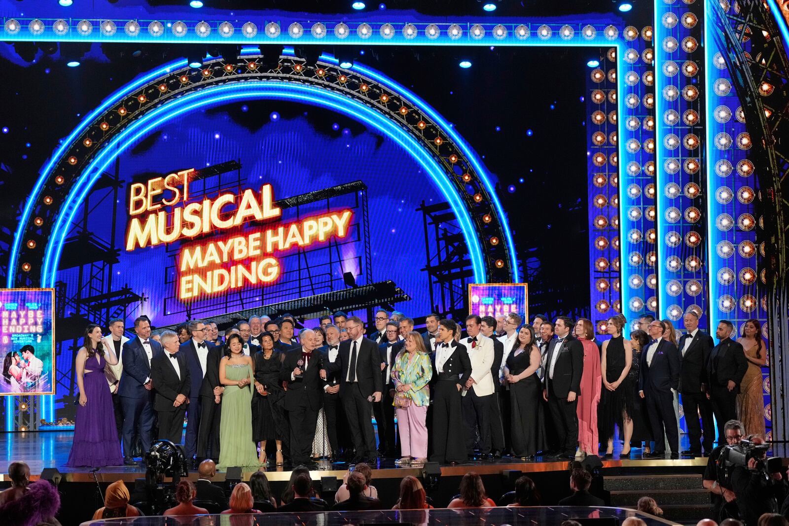 The cast and crew of "Maybe Happy Ending" accept the award for best musical for during the 78th Tony Awards on Sunday, June 8, 2025, at Radio City Music Hall in New York. (Photo by Charles Sykes/Invision/AP)