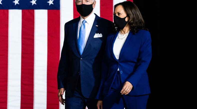 FILE - Democratic presidential nominee Joe Biden and his running mate, Sen. Kamala Harris (D-Calif.) at their first even together in Wilmington, Del., Aug. 12, 2020. Harris, the daughter of an Indian mother and Jamaican father, has risen higher in the country’s leadership than any woman ever before her. (Erin Schaff/The New York Times)