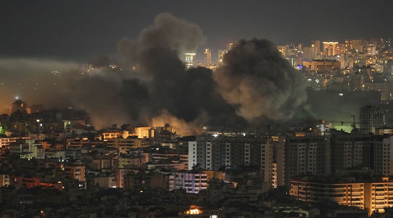 Smoke rises following an Israeli airstrike in the Dahiyeh area of Beirut, Thursday, March 5, 2026. (AP Photo/Hassan Ammar)