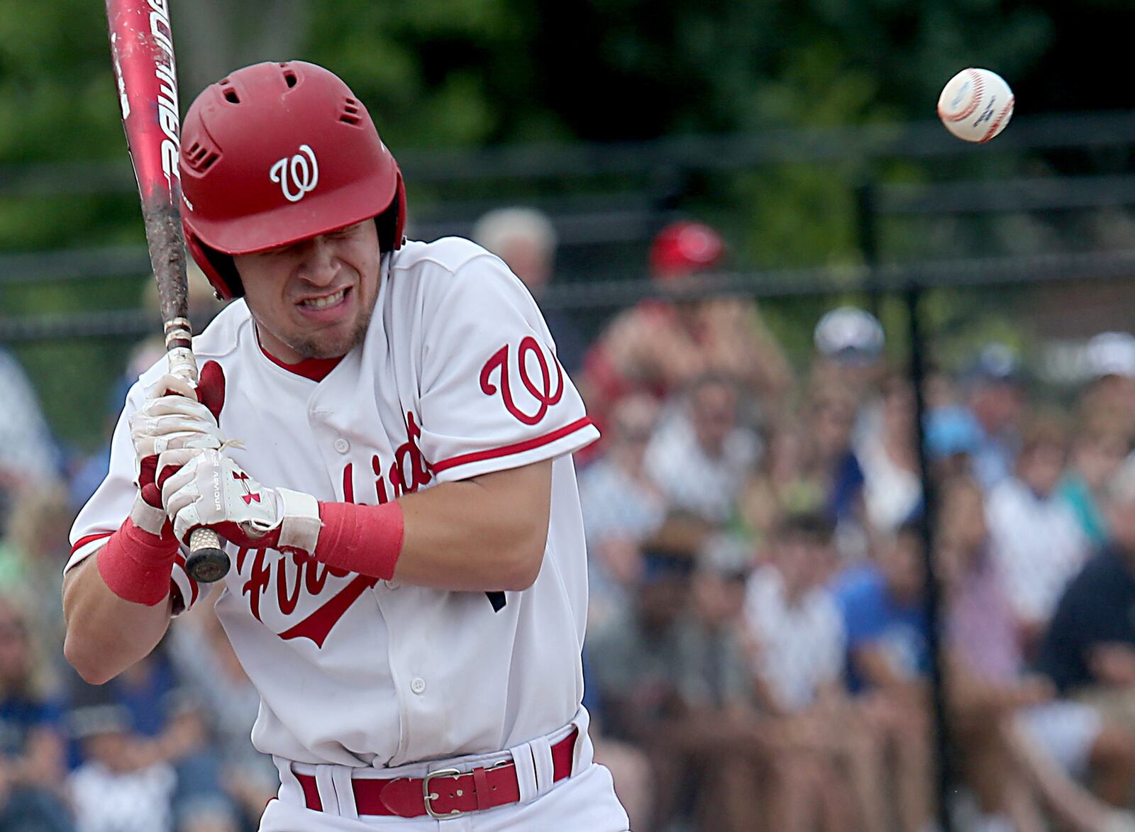 Lakota West’s Brennen Martin gets hit in the head by a Springboro pitch in the first inning of Saturday’s Division I district final at Springboro. Martin remained in the game and went on to score two runs. CONTRIBUTED PHOTO BY E.L. HUBBARD
