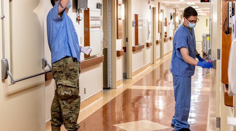 Members of the Ohio National Guard are helping at Miami Valley Hospital in Dayton as Ohio experiences staffing shortages at hospitals across the state during the COVID-19 pandemic. Guard members arrived on Dec. 30, 2021, for orientation and have been assisting with food service, environmental services, patient transport and other non-clinical jobs. Members have arrived this week to perform similar duties at Atrium Medical Center in Middletown and Christ Hospital in Liberty Twp. Photo courtesy Premier Health