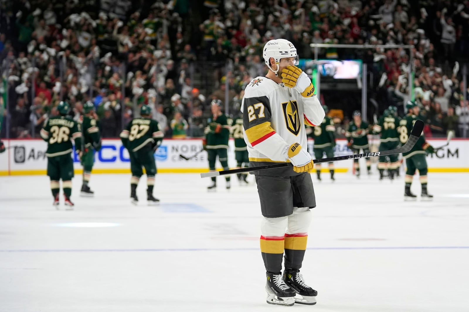 Vegas Golden Knights defenseman Shea Theodore (27) skates as time expires during the third period of Game 3 of a first-round NHL hockey playoff series against the Minnesota Wild, Thursday, April 24, 2025, in St. Paul, Minn. (AP Photo/Abbie Parr)