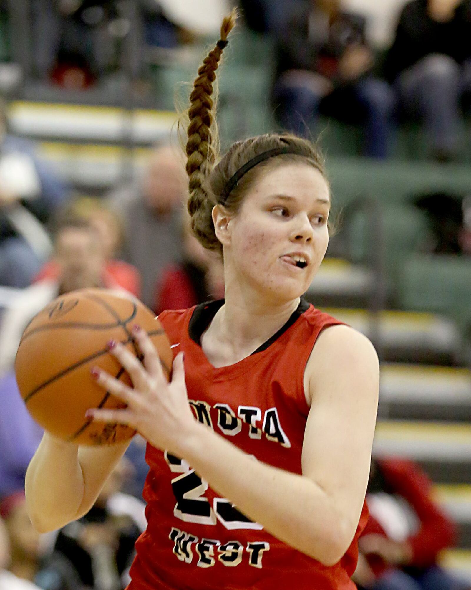 Lakota West’s Christine Laritz grabs a rebound during Saturday afternoon’s game against Mason at the Mason Arena. CONTRIBUTED PHOTO BY E.L. HUBBARD