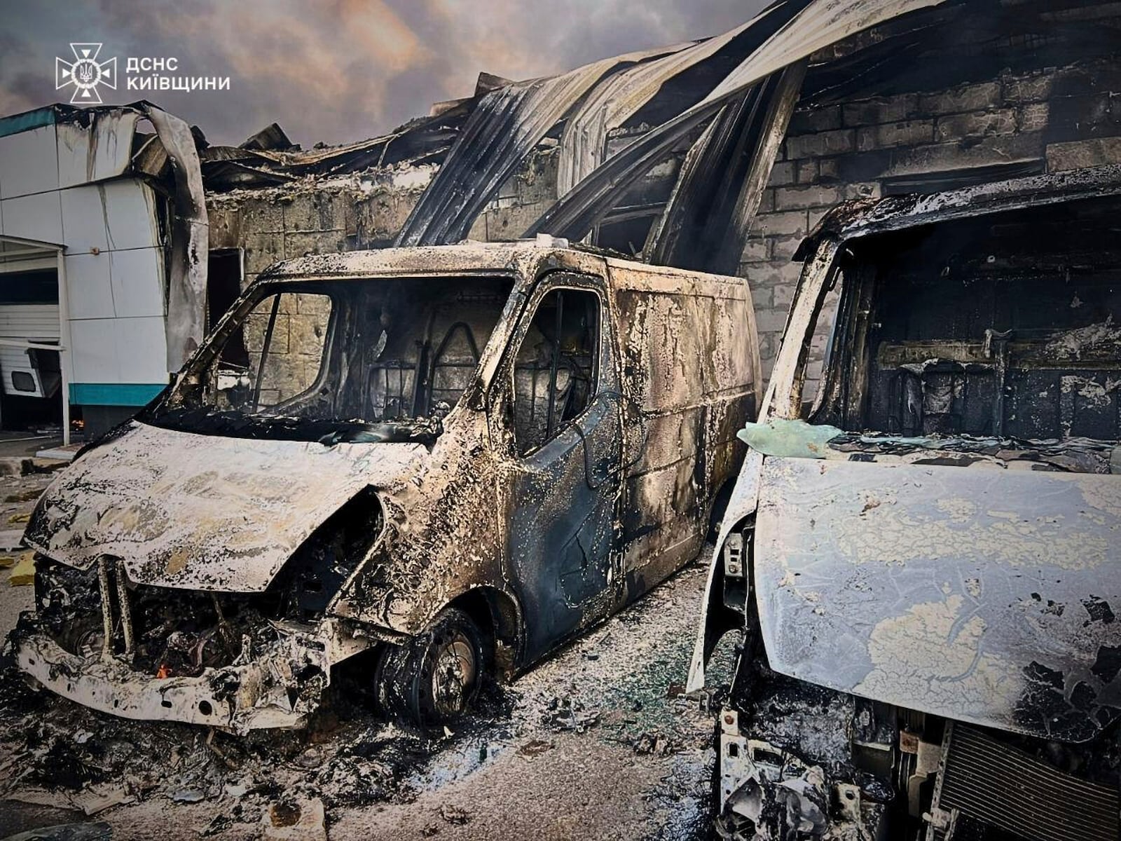 In this photo provided by the Ukrainian Emergency Service, firefighters put out the fire following Russia's drone attack in the Kyiv region, Ukraine, Sunday, May 18, 2025. (Ukrainian Emergency Service via AP)