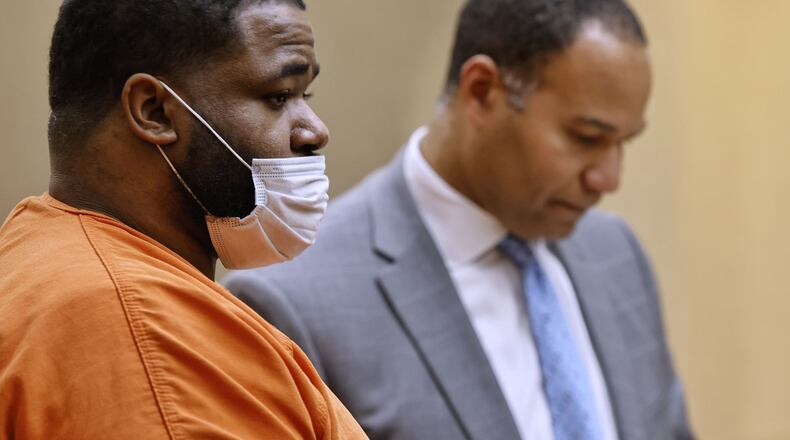 Mychel King, with attorney Lawrence Hawkins III, was sentenced to life in prison with opportunity for parole after 28 years in Butler County Common Pleas Court Thursday, Sept. 23, 2021 in Hamilton. King was found guilty in the 2016 death of Jaylon Knight. NICK GRAHAM / STAFF