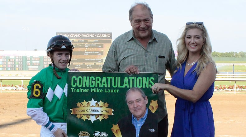 Mike Lauer, a Hamilton native, was honored for his 1,000th career training victory at Indiana Grand. He was joined by jockey Declan Cannon, who guided Miracles Take Time to the win. Racing analyst Rachel McLaughlin made the presentation.