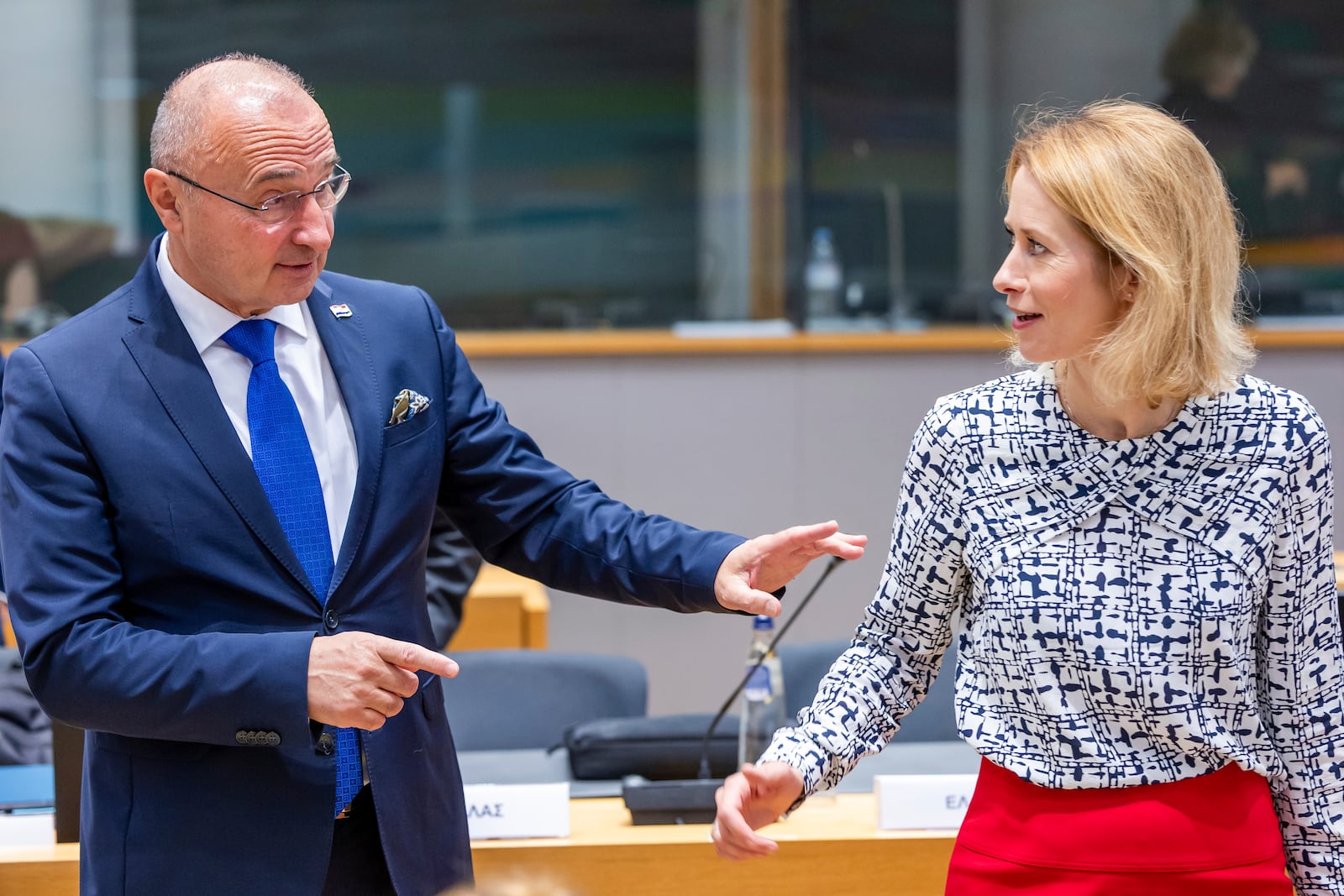 Croatia's Foreign Minister Gordan Grlic Radman, left, talks with European Union foreign policy chief Kaja Kallas during the EU foreign ministers meeting at the EU Council building in Brussels, Tuesday, July 15, 2025. (AP Photo/Geert Vanden Wijngaert)