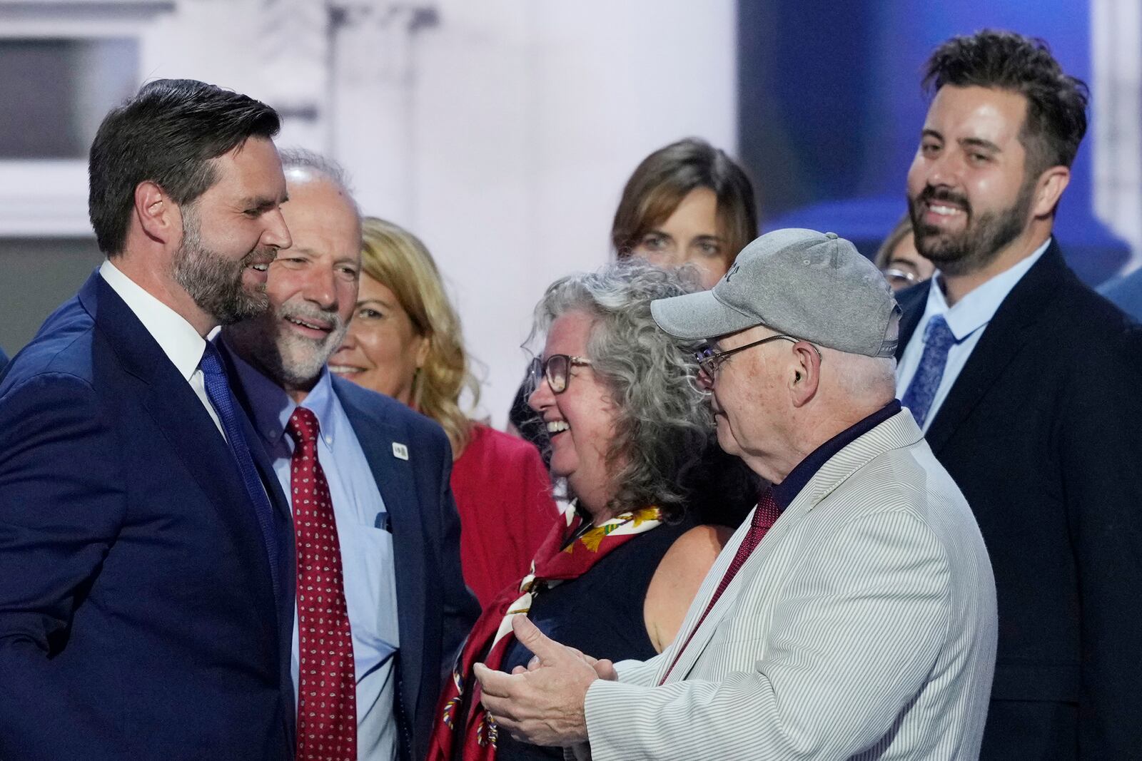 Cory Bowman, half-brother of Republican vice presidential candidate Sen. JD Vance, R-Ohio, top right, is pictured on stage with Vance, left, during the Republican National Convention, Wednesday, July 17, 2024, in Milwaukee. (AP Photo/J. Scott Applewhite)