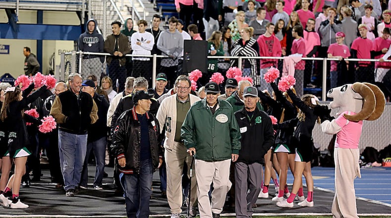 Members of the 1966 Badin High School football team, the only unbeaten and untied squad in school history, gathered for a 50-year reunion Saturday night at Virgil Schwarm Stadium in Hamilton. CONTRIBUTED PHOTO BY E.L. HUBBARD