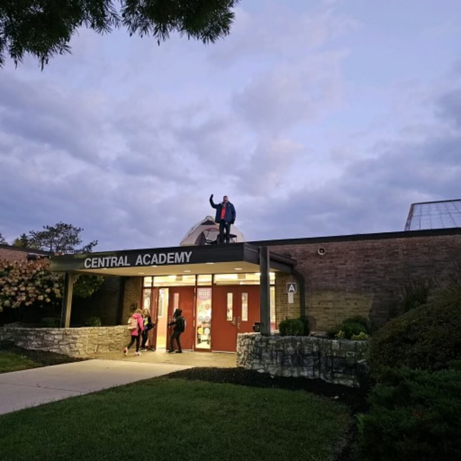 It was a cold night last week when Central Academy Principal Stephen Sippel camped on top of the Middletown school's rooftop. Sippel did so because his students met a $10,000 fundraising goal. CONTRIBUTED