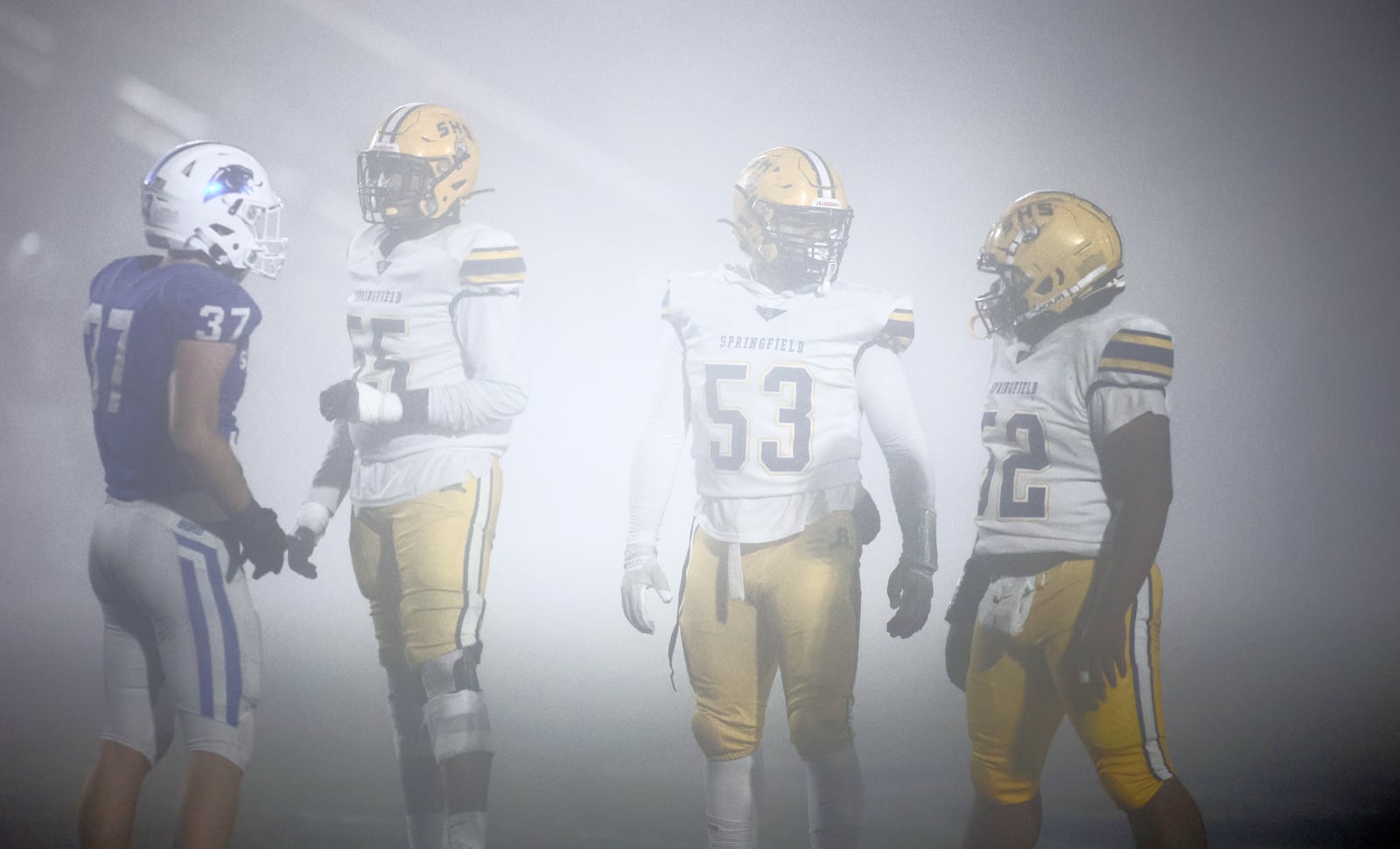 Springfield and Springboro play in the fog in the second round of the Division I, Region 2 playoffs on Friday, Nov. 7, 2025, at CareFlight Field in Springboro. David Jablonski/Staff