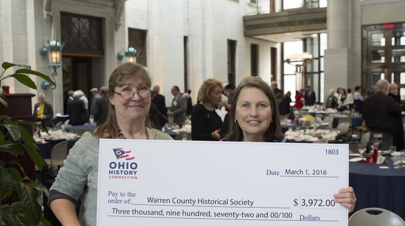 Vicky Van Harlingen (right) and Jeanne Doan receive grant for the Warren County Historial Society on behalf of the Ohio History Fund for War & Remembrance, an oral history of veterans of the last six wars. CONTRIBUTED
