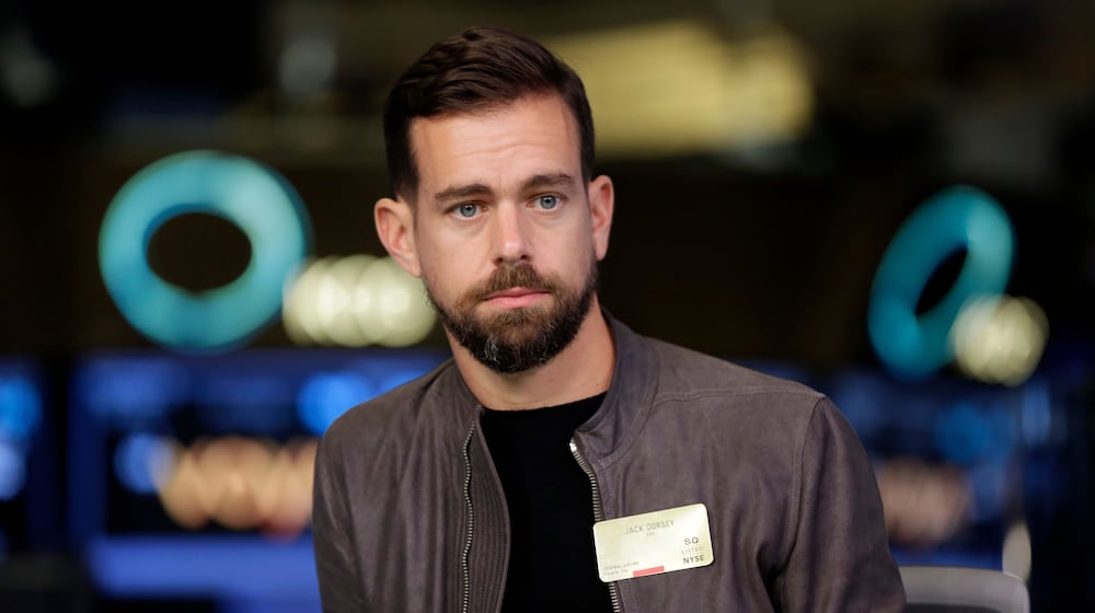 File- This photo taken Nov. 19, 2015, shows Square CEO Jack Dorsey being interviewed on the floor of the New York Stock Exchange. (AP Photo/Richard Drew, File)