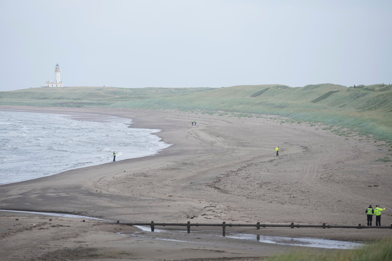 Police guard the Trump Turnberry golf course in Turnberry, Scotland, Friday, July 25, 2025, ahead of President Trump's visit Scotland. (AP Photo/Alastair Grant)
