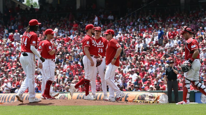 Reds manager David Bell visits the mound during a game against the Dodgers on Thursday, June 8, 2023, at Great American Ball Park in Cincinnati. David Jablonski/Staff