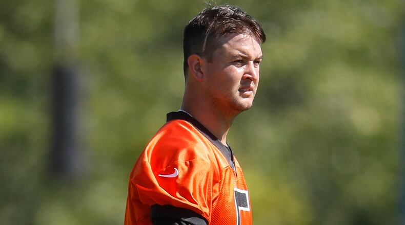 Cincinnati Bengals quarterback AJ McCarron walks the field during an NFL football training camp, Saturday, July 29, 2017, in Cincinnati.