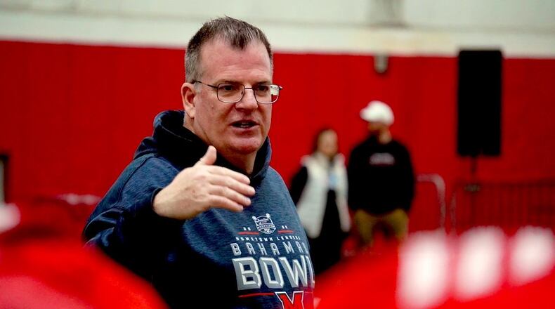 Miami University football coach Chuck Martin addresses the team after its annual Spring Showcase on Saturday inside the Dauch Indoor Sports Center. CHRIS VOGT/CONTRIBUTED PHOTO
