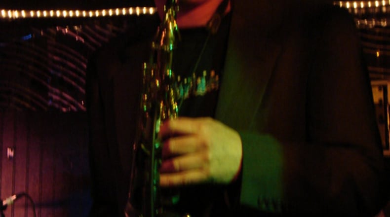 Chuck Evans plays sax during a previous year’s Blue Christmas concert. CONTRIBUTED