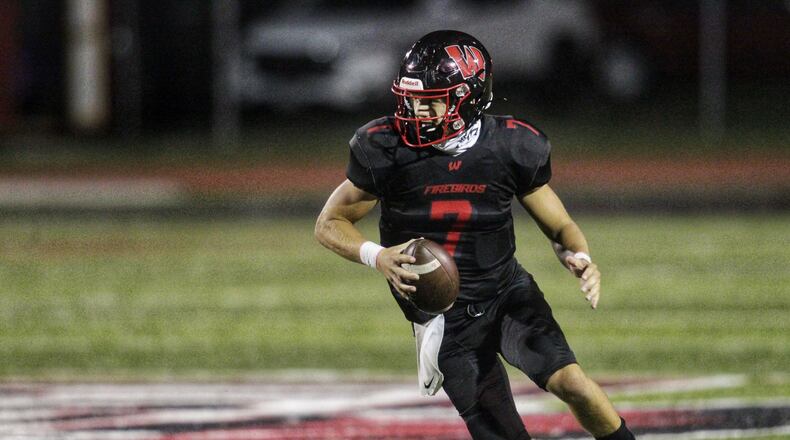 Lakota West quarterback Mitch Bolden tossed three touchdown passes in the Firebirds' 40-13 win over Hamilton on Friday, Sept. 4, 2020. Nick Graham/STAFF