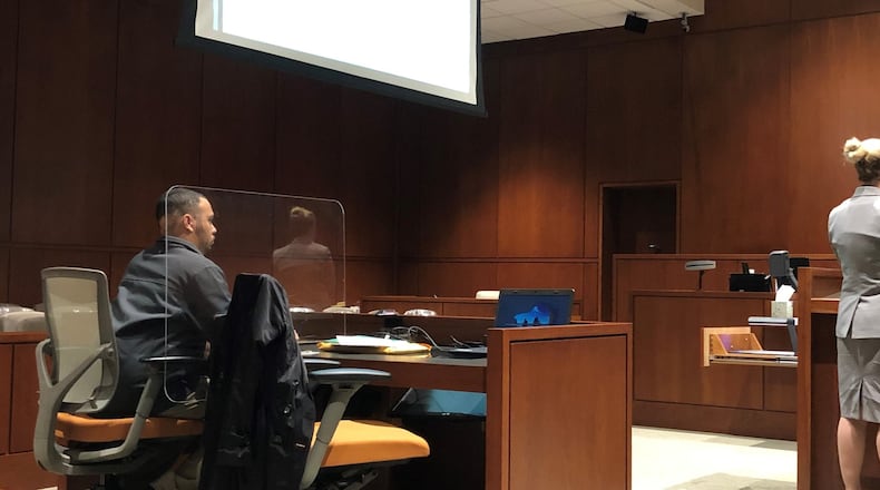 Ex-Corrections Officer Ari Combs, accused of sexual battery on an inmate at Warren Correctional Institution last September, listens Monday during a suppression hearing in Warren County Common Pleas Court. Combs’ statements to investigators were suppressed, complicating prosecution of the case. STAFF/LAWRENCE BUDD