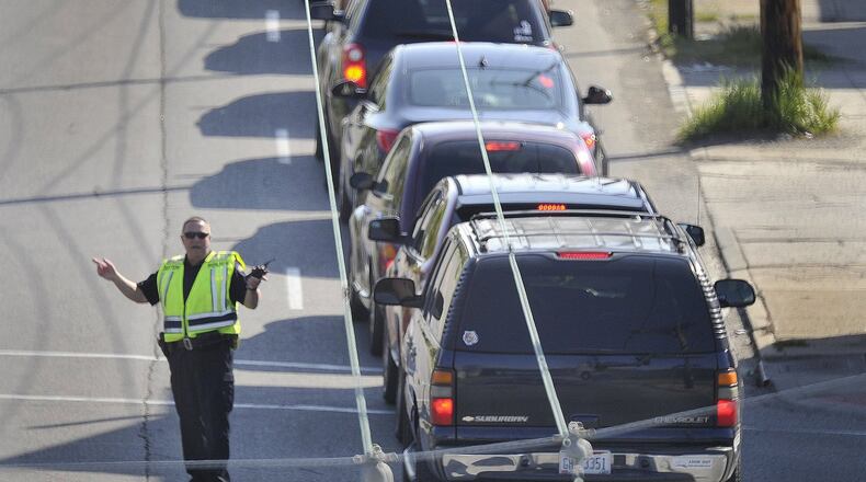 Long lines of cars were drawn to a food distribution event in April. MARSHALL GORBYSTAFF