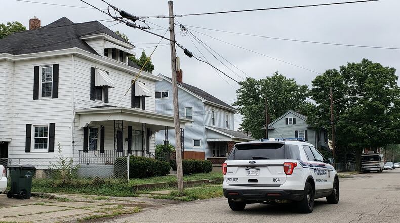 A Sherman Avenue house where police executed search warrant Monday seizing cash, drugs and guns. NICK GRAHAM/STAFF