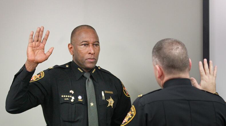 Montgomery County Sheriff’s Office Maj. Daryl Wilson was sworn in Tuesday as chief deputy by new Sheriff Rob Streck. CHRIS STEWART / STAFF