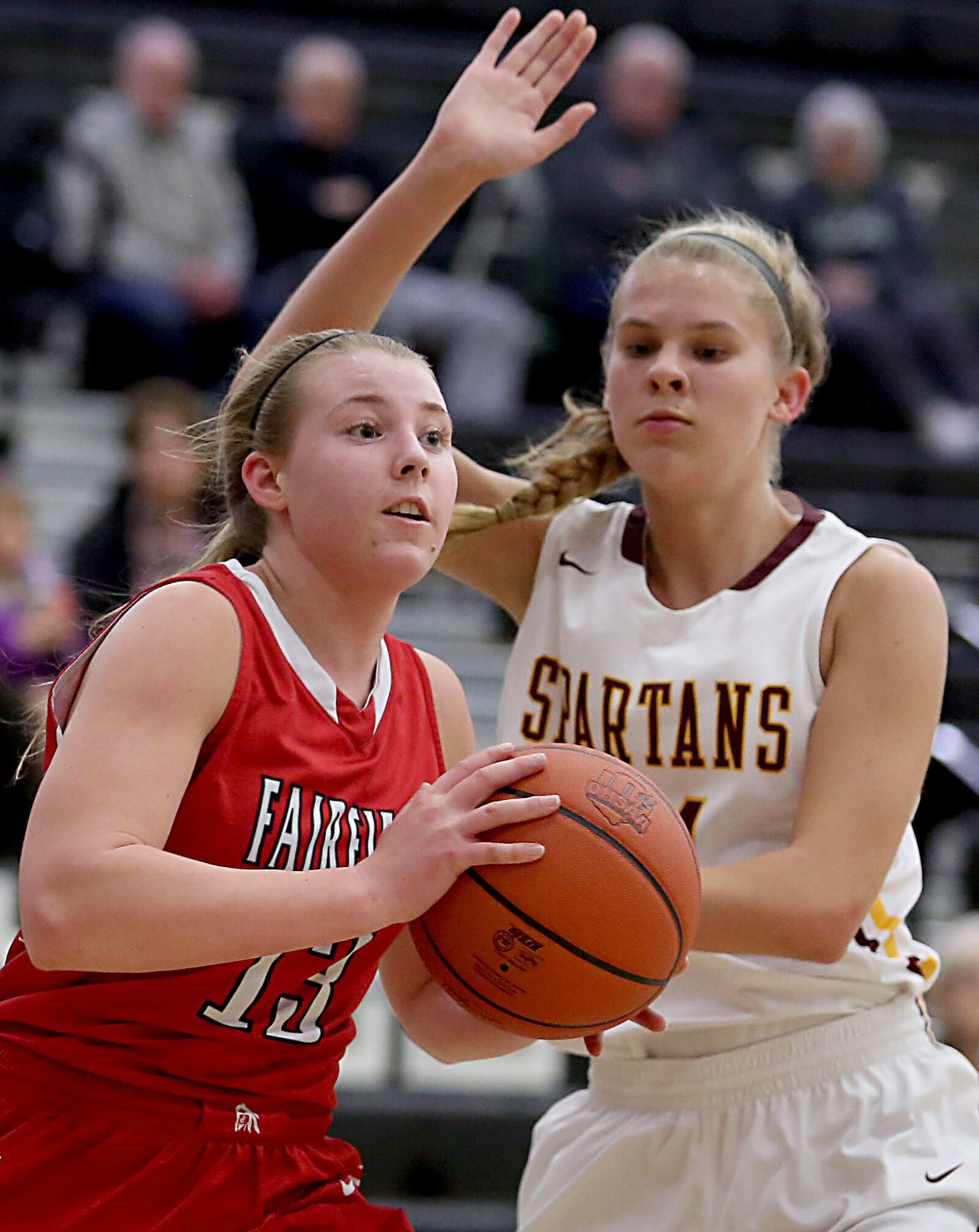 Fairfield forward Addie Kidd drives to the lane while being covered by Turpin forward Lindsey Viel during their Division I sectional semifinal Thursday night at Lakota East. CONTRIBUTED PHOTO BY E.L. HUBBARD